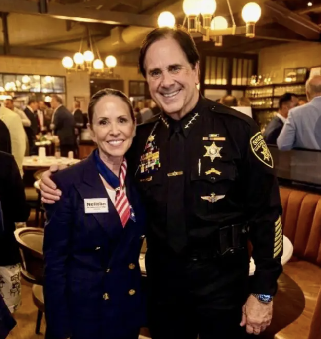 Lisa Neilson with Oakland County Sheriff Michael J. Bouchard